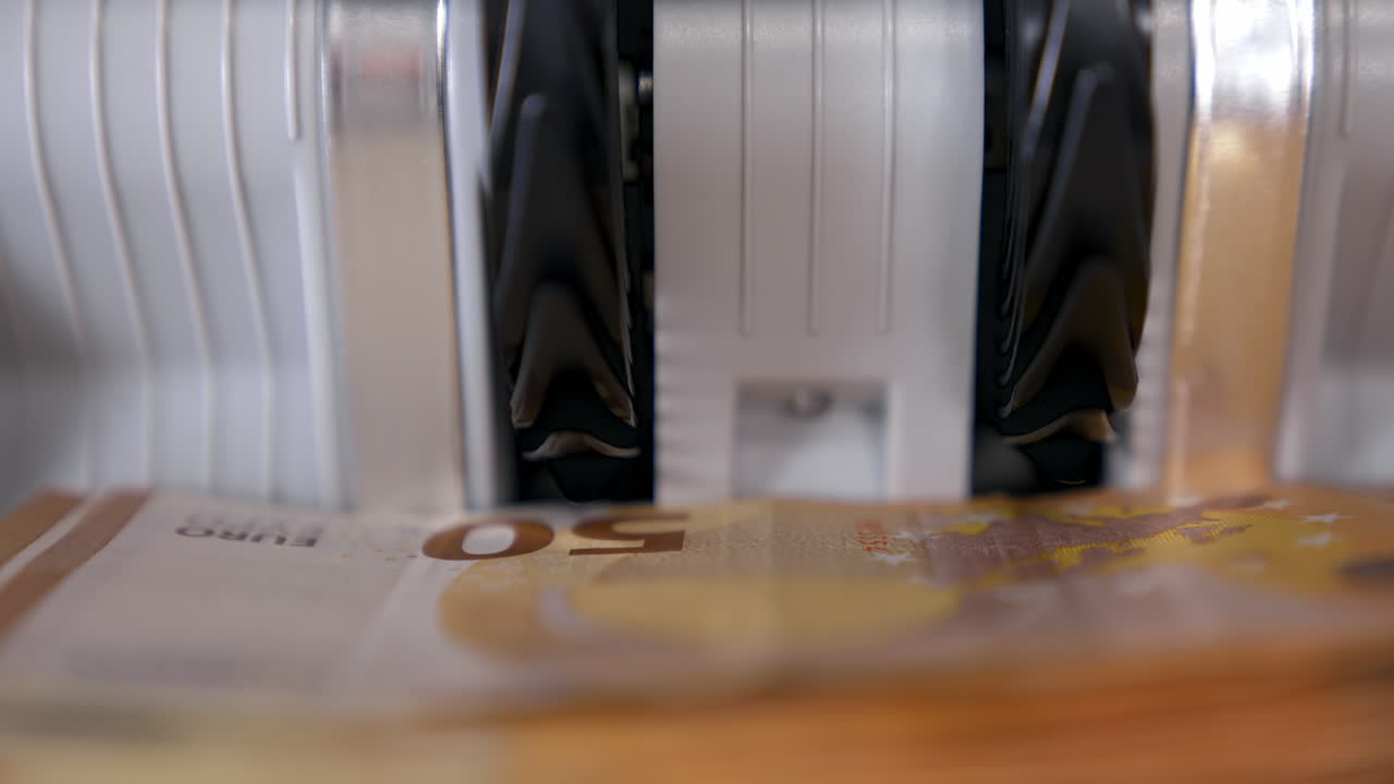 Machine for counting money. Euros banknotes. Finance concept. Mechanism for bank financial operations