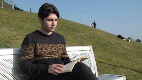 Reading-Book-On-Bench