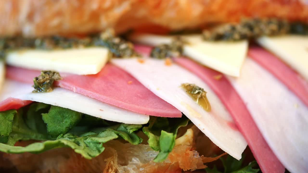 Croissant Sandwich with Ham, Cheese, and Pesto