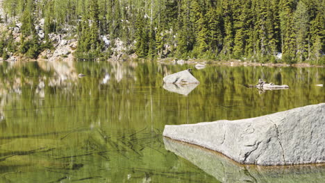 Mountain-pond-and-far-lake-shore