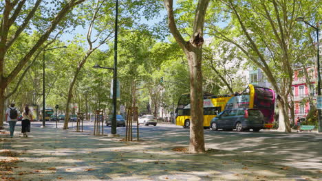 city street scene with bus and pedestrians