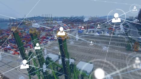 animation of network of connections with icons over shipyard in background