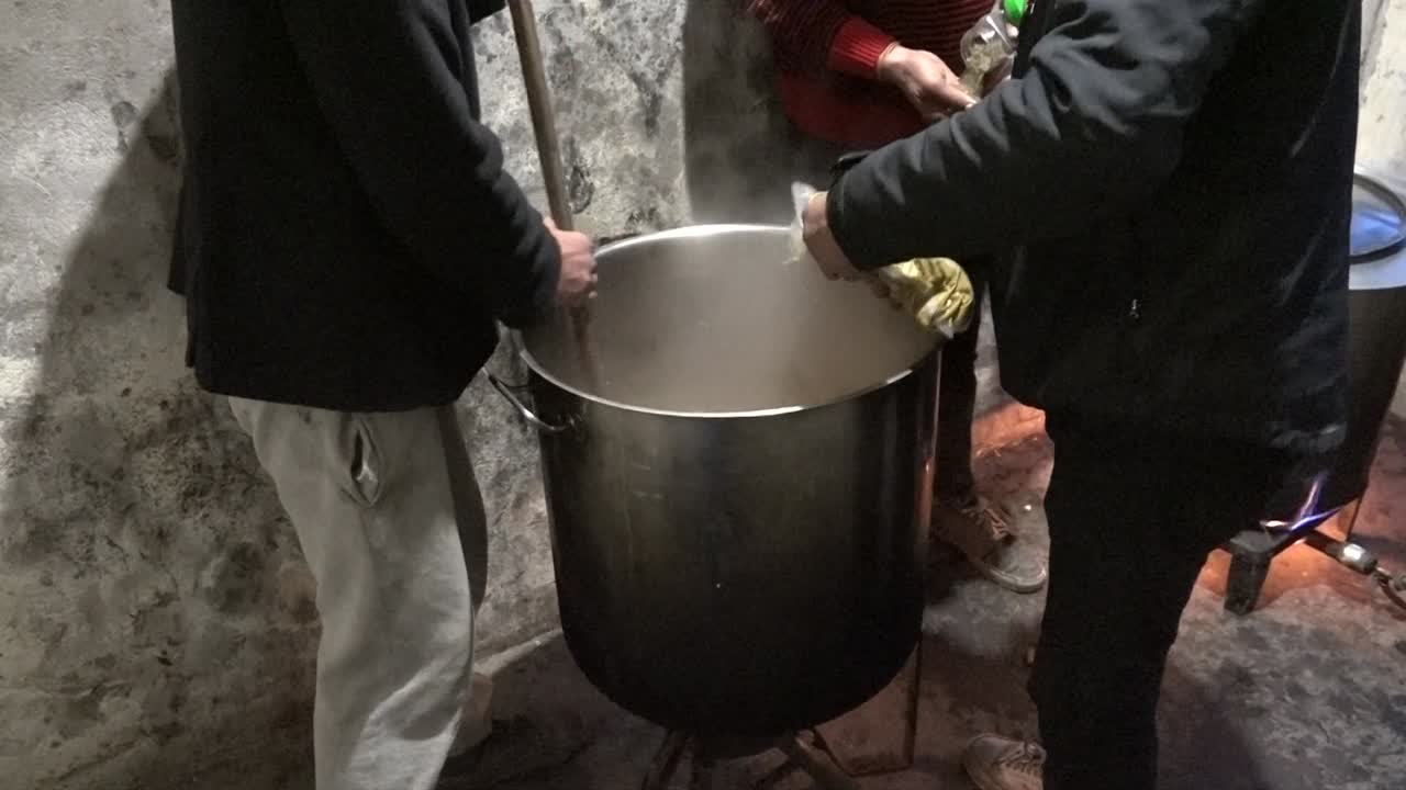 Pakistani migrants prepare a meal in an abandoned building along the  Serbian border with Croatia. Sid, Serbia, 02-09-18