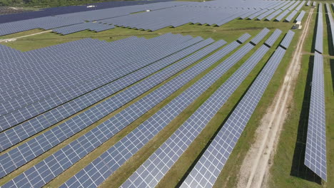 aerial fly over of solar array, farm or power plant, sunny, portugal