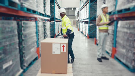 Boxes,-warehouse-trolley-and-black-man-transport