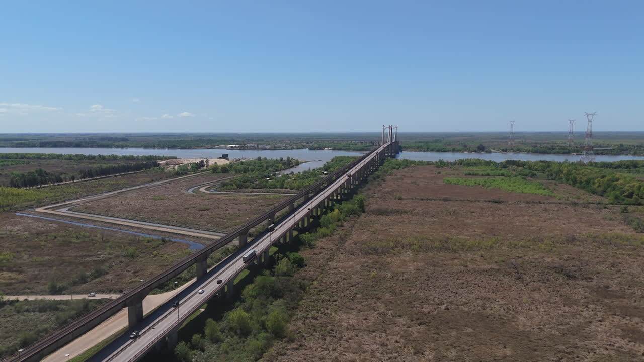 Aerial View of a Long Bridge Over a River