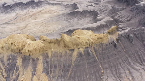 Eroded rock formations in a rugged desert landscape near Moab, Utah, showcasing natural beauty