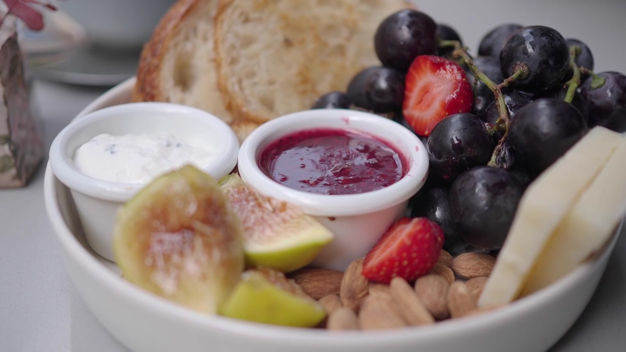 Close-up of a Gourmet Charcuterie Board with Fruit and Cheese