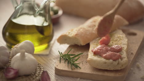 rustic bread, tomato and olive oil ready to make toasts