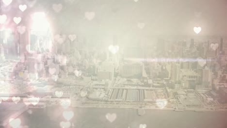 city with flying hearts