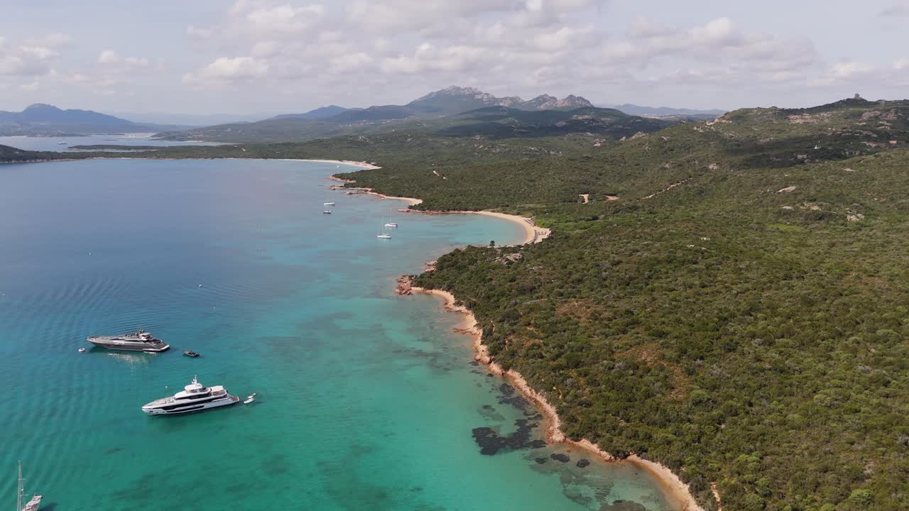 Sardinia cala di volpe aerai footage of scenic cliff on the unpolluted sea water in travel destination in Italy