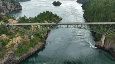 wide aerial shot of the deception pass bridge on fidalgo island