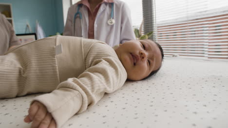 baby exam with pediatrician