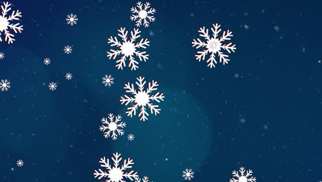 animation of christmas snowflakes falling on blue background