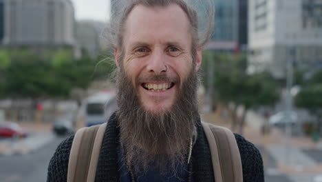 portrait mature bearded hippie man laughing happy enjoying carefree urban lifestyle homeless beggar in city wearing nose ring