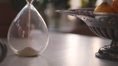 Hourglass-sand-falling-in-slow-motion-cinematic-paning