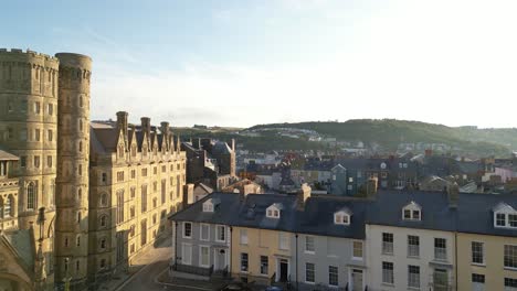 drone footage on a summer day in uk wales aberystwyth around the beach, harbour, sea side, clif and town front-5