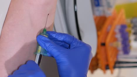 nurse in gloves taking blood from patient finger using glass slide in laboratory closeup 4k movie slow motion. complete blood count laboratory diagnostics
