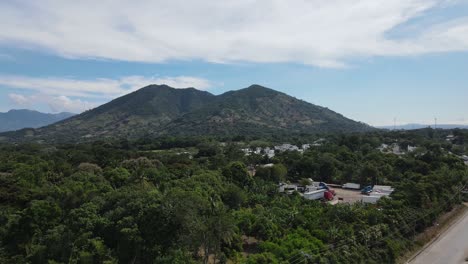 view of a mountain with a very blue sky in the background