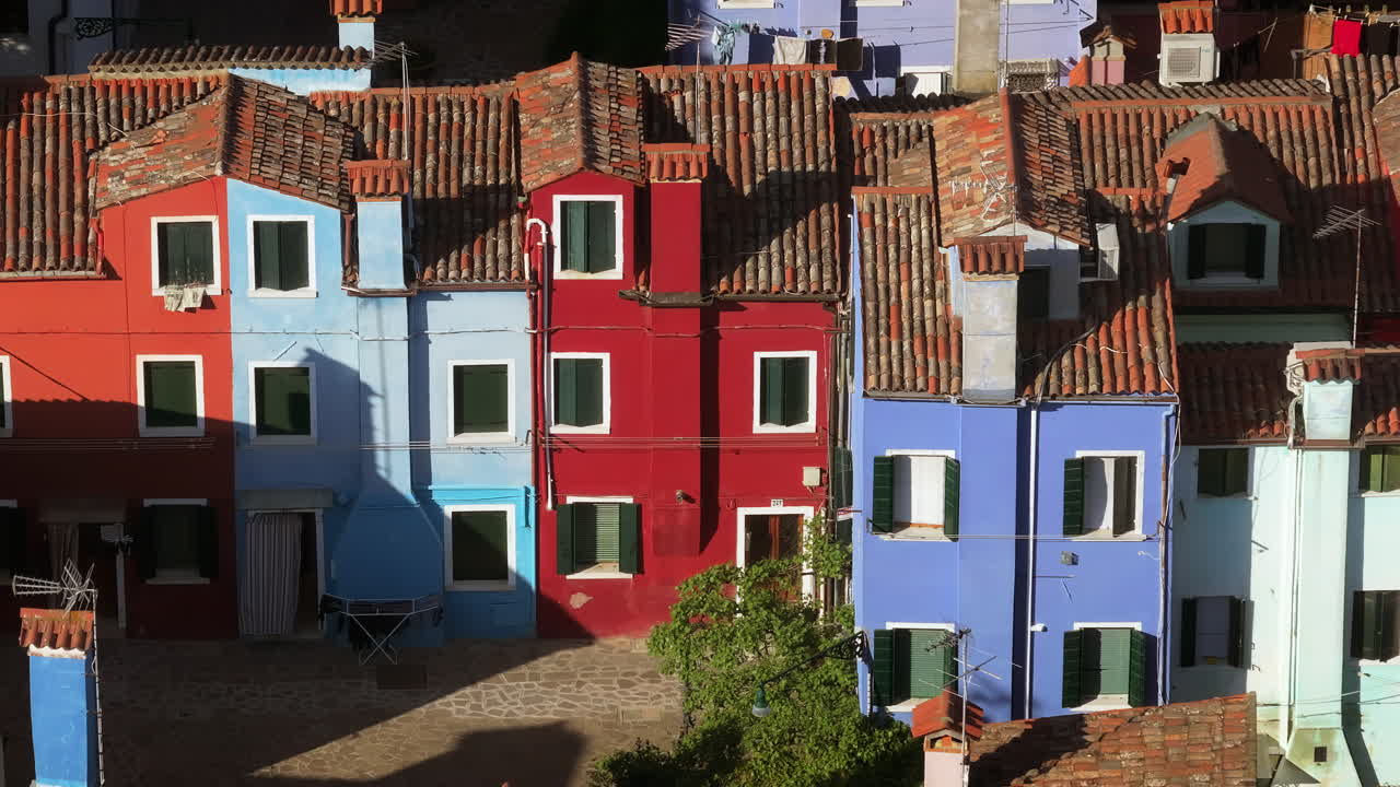 Aerial drone view of the colourful houses of Burano Island, Italy