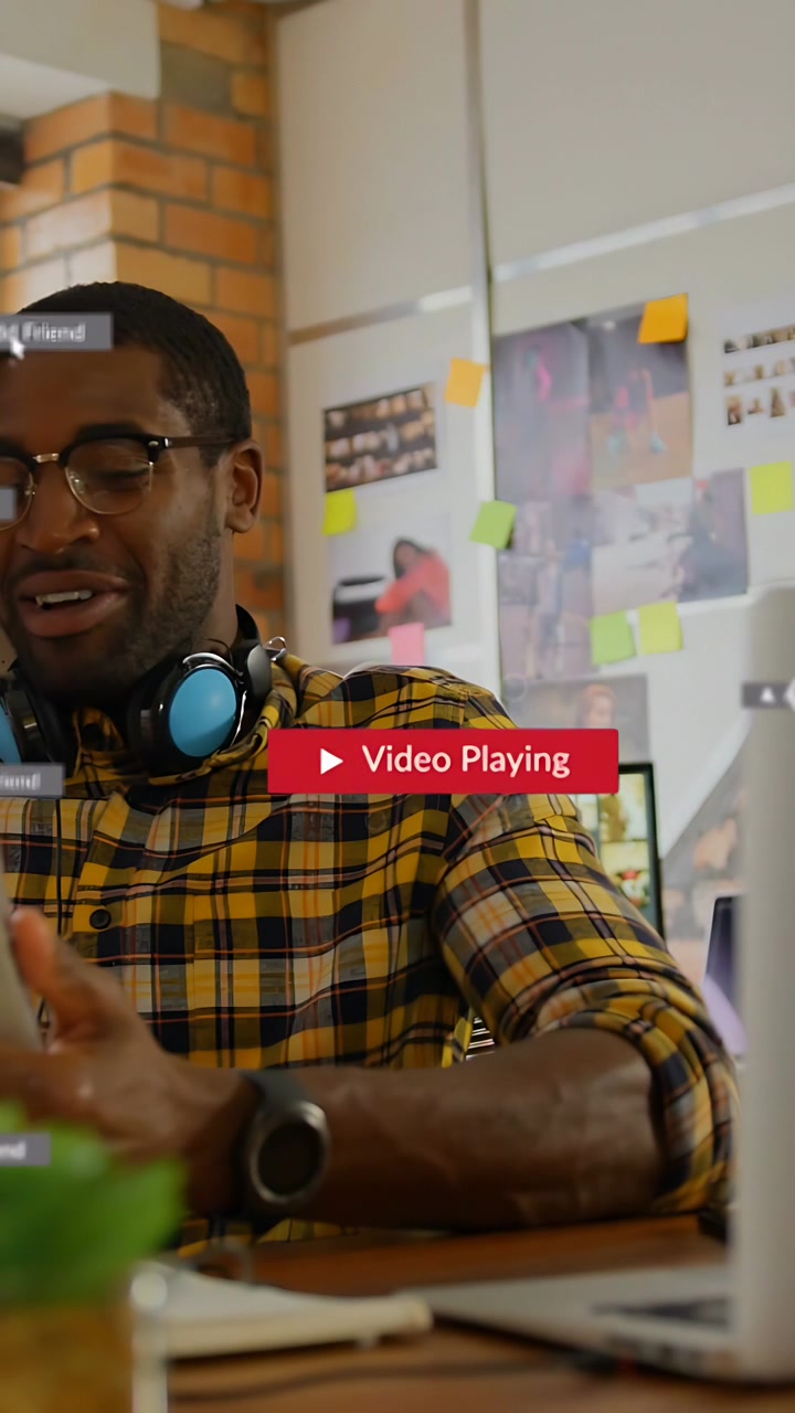 Vertical video: Cursor clicking play icon, man using PC animating UI badges on screen while sharing