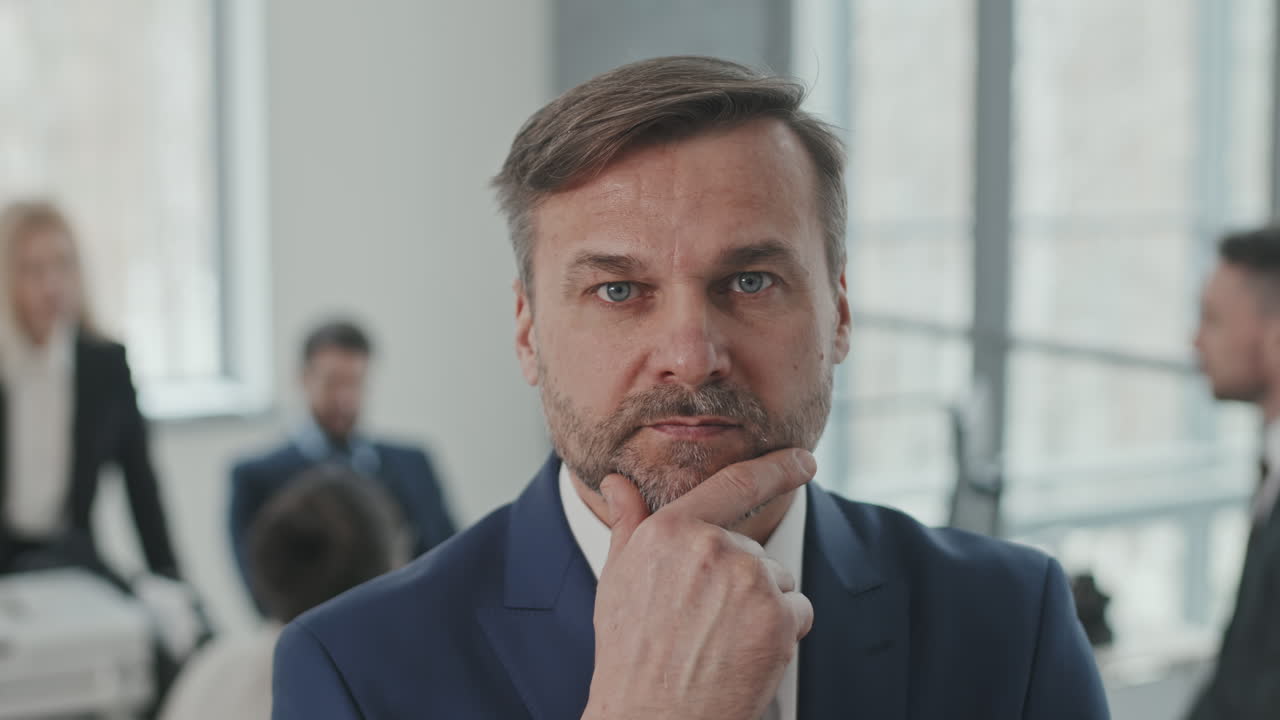 Close-Up Portrait of Mature Lawyer in Office