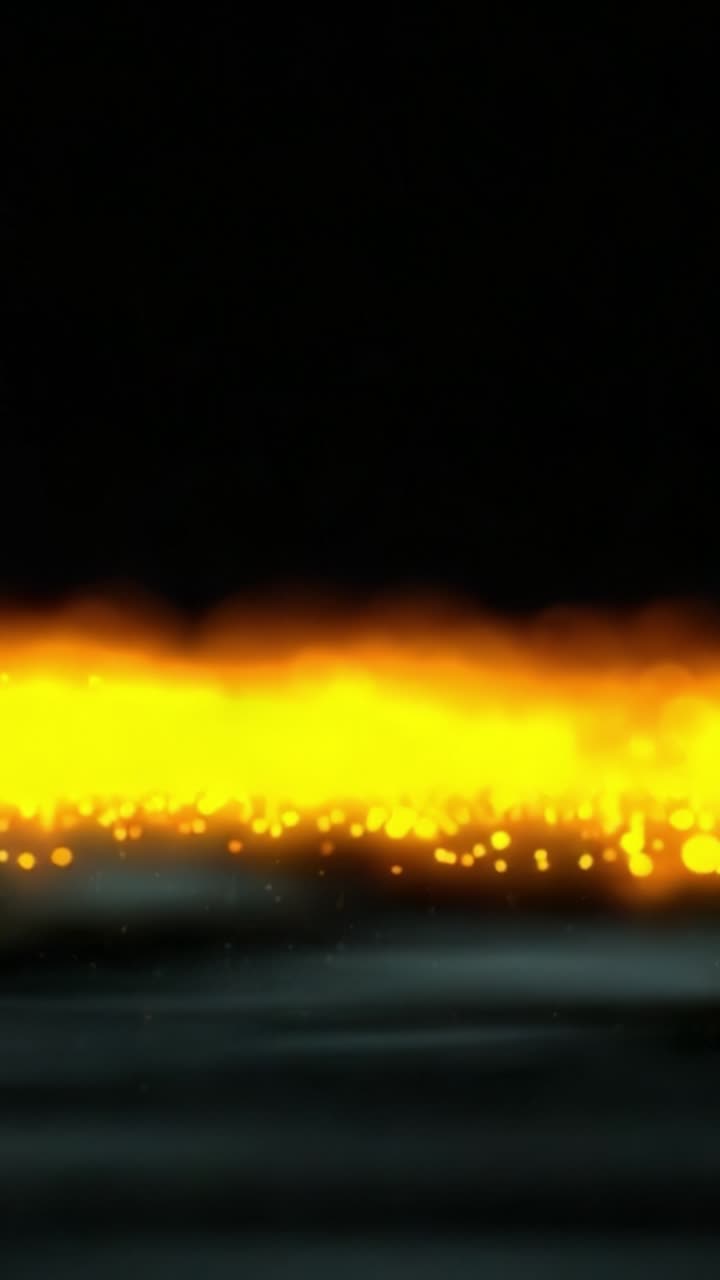 A mesmerizing display of golden particles shimmering against a dark backdrop, creating an enchanting atmosphere filled with warmth and ethereal beauty