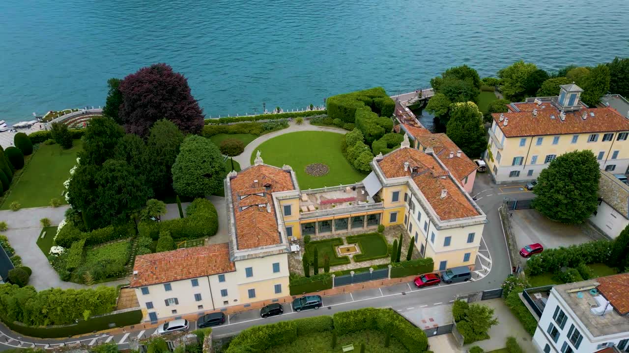 4K Aerial Drone Video of the Beautiful Lakeside Gardens of Villas on Lake Como, Italy in the Summer
