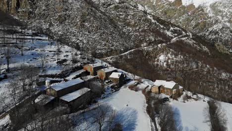 Aerial:-snowy-mountain-town-on-a-mountain-slope-in-the-catalan-pyrenees
