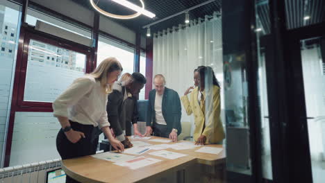 business-meeting-and-brainstorming-in-IT-or-construction-company-multiracial-team-of-specialists