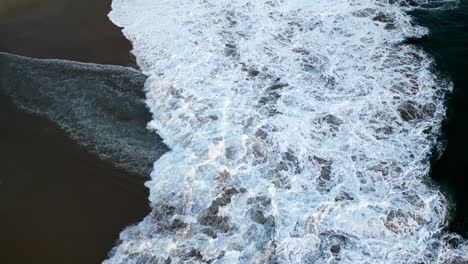 aerial waves crushing at puerto escondido bacocho shore, coastline top drone sea mexico