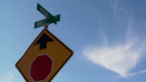 A-street-sign-indicates-the-intersection-of-Main-and-Wall-Streets-7