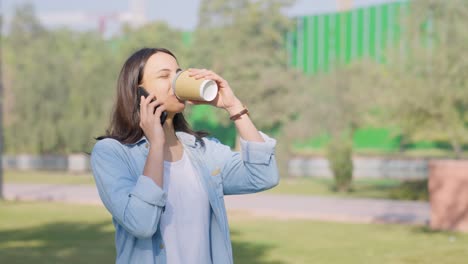 indian boss talking on a phone