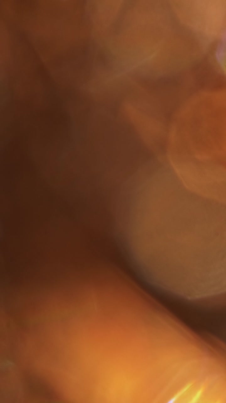 Perdite di luce calde astratte e transizione overlay Bokeh