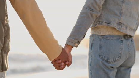 couple, holding hands and beach with love