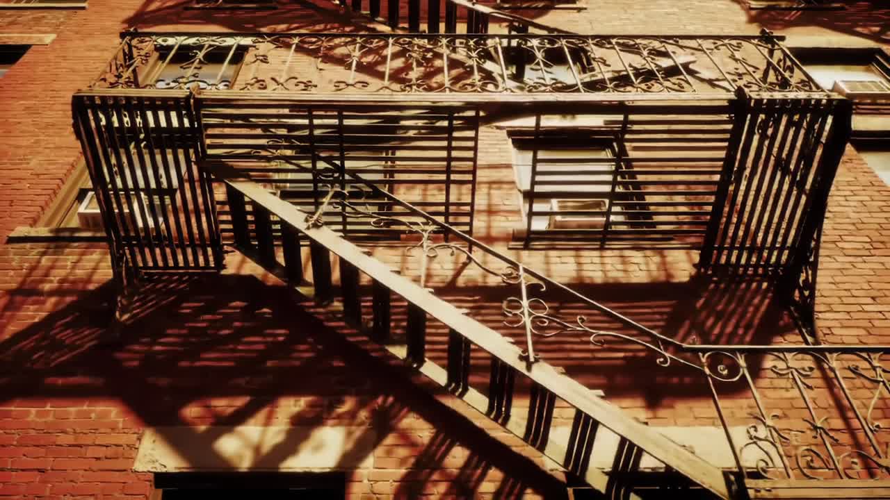 Intricate Fire Escape Staircase with Shadow Play on Vintage Brick Building Facade in Warm Light - A Captivating Perspective of Urban Architecture