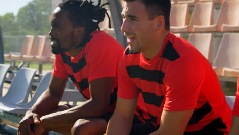 football players waiting in the stadium 4k