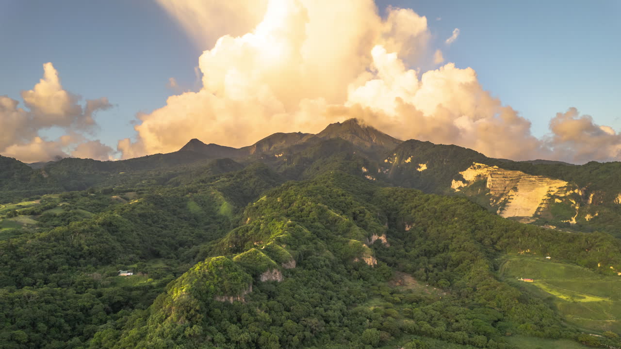 Hyperlapse of mount Pel&eacute;e in Martinique with fast moving clouds during sunset