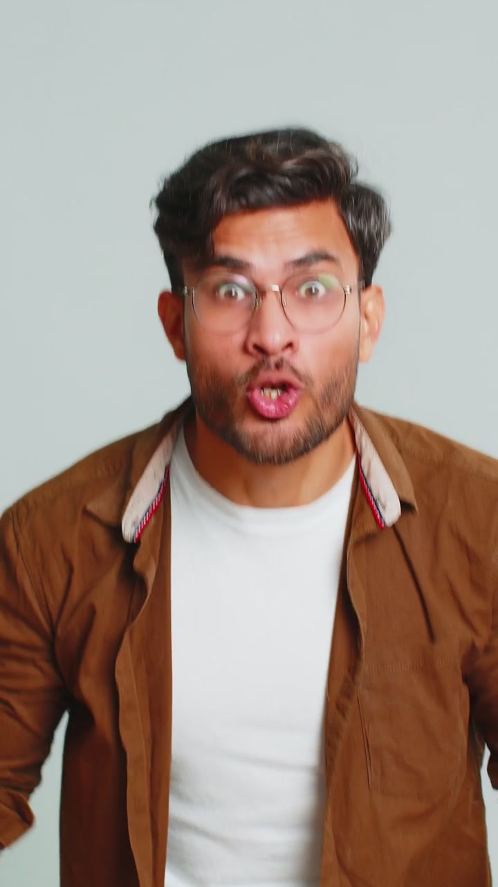 Irritated angry indian man screams from stress tension problems shock rage nervous quarrel