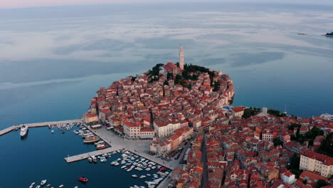 bird's eye view of the town of rovinj at adriatic coast with marina port in istria, croatia
