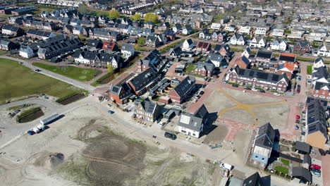 Cinematic-aerial-of-newly-build-houses-with-solar-panels-on-rooftop