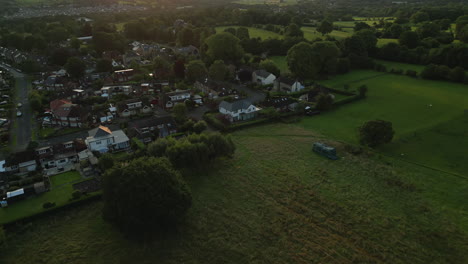 Establishing-Drone-Shot-Panning-Up-Over-Calverley-Village-at-Sunrise