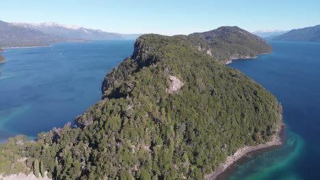 rising aerial of los arrayanes national park on lago nahuel huapi
