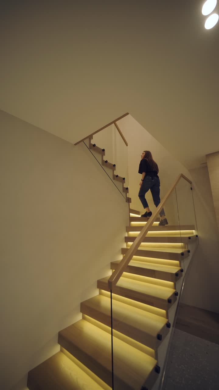 Stylish and elegant minimalist home interior featuring clean lines, neutral colors, and warm ambient lighting, creating a cozy and modern atmosphere.