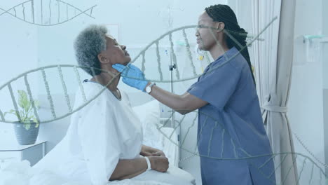 animation of dna strands over african american female doctor giving senior patient check up