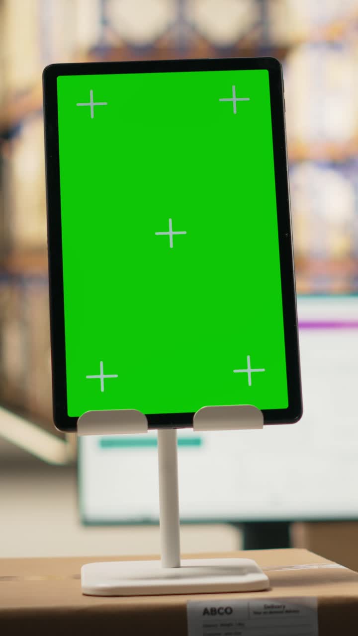 Vertical Video Fulfillment center with chroma key on tablet handling delivery service