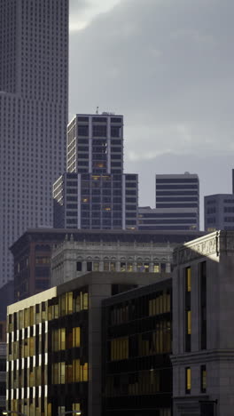 urban skyline at dusk highlighting modern architecture and historic buildings