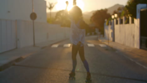 Girl-On-Roller-Skates-at-Sunset