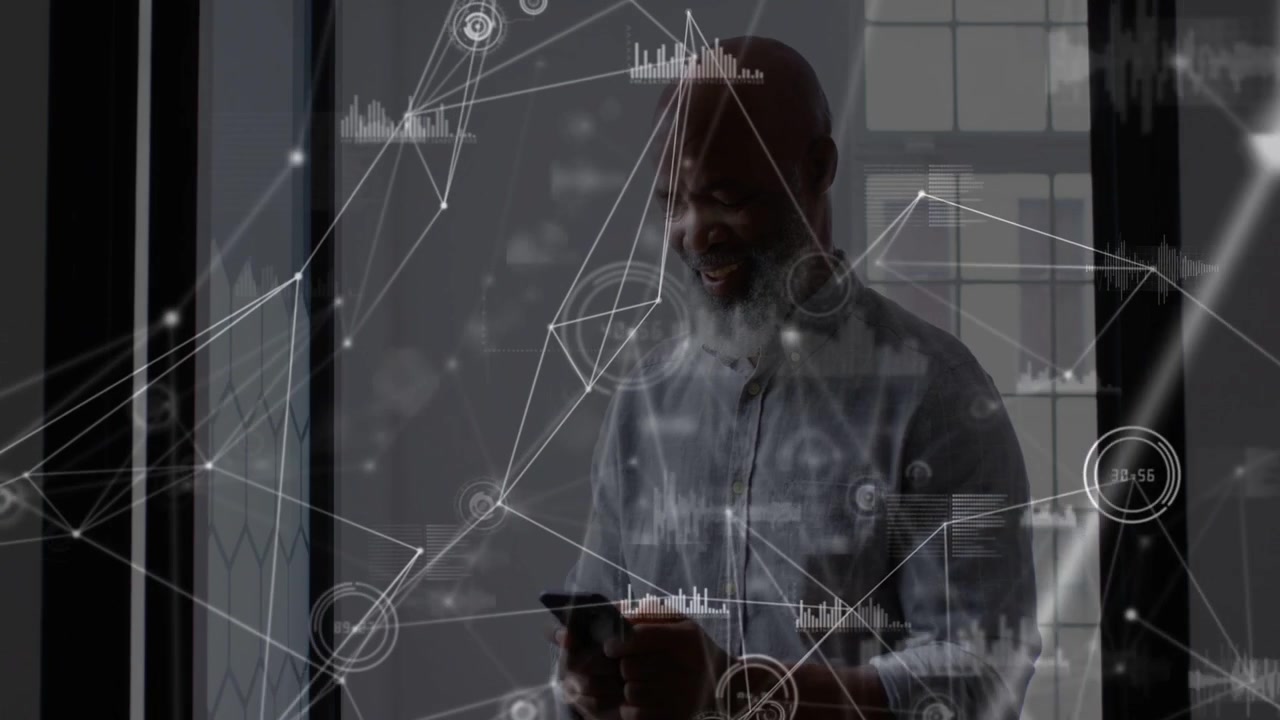 Senior man taking phone in office, animating network overlays around screen for business insights