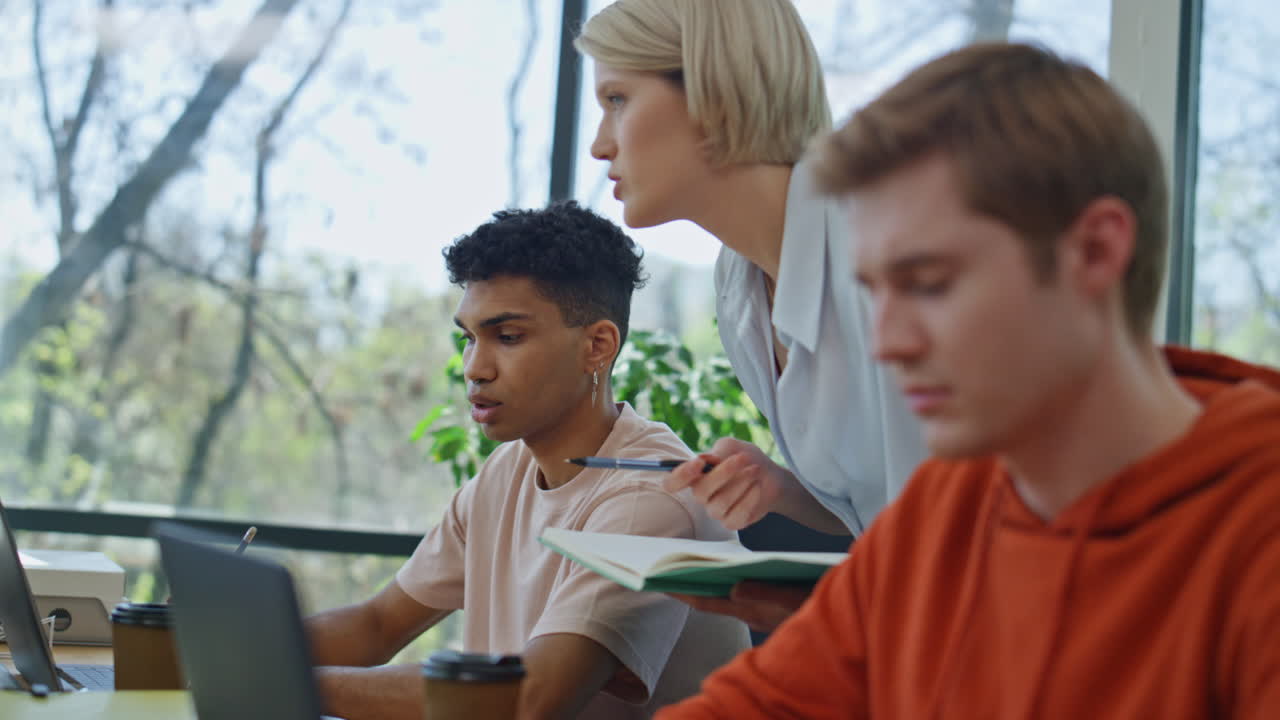 Serious mentor consulting colleague office closeup. Smart woman giving advices